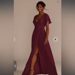 Flutter sleeves and pleats wrap around the bodice WINE color size 24